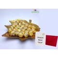 Beautiful Leaf Tray with full of New Year Chocolate balls 